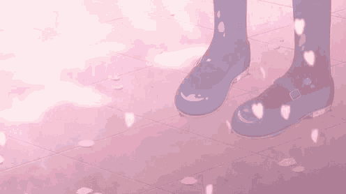 a person wearing a pair of blue shoes is standing on a pink tiled floor surrounded by petals .