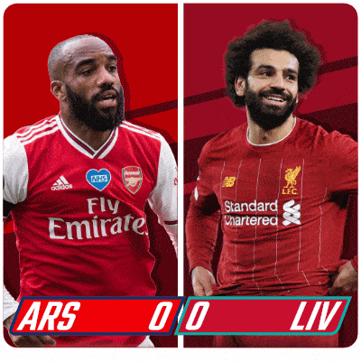 two soccer players one from fly emirates and the other from liverpool are standing next to each other