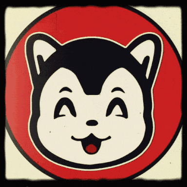 a red circle with a black and white cat 's face in it