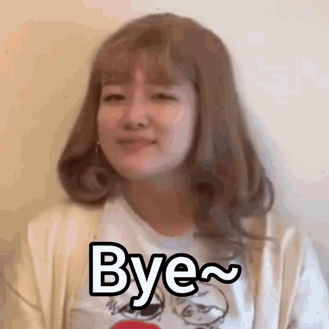 a woman is making a funny face and saying `` bye '' with her eyes closed .