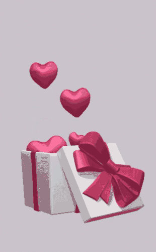 a white gift box with a pink bow and hearts flying out of it