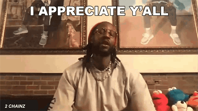 a man with dreadlocks and glasses says i appreciate y'all