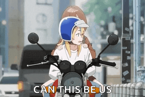 a girl is riding a motorcycle with another girl on the back and says `` can this be us '' .