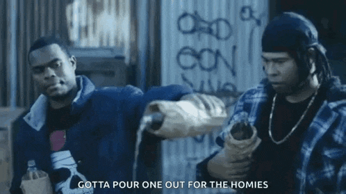 a man pouring water into another man 's hand with the words gotta pour one out for the homies on the bottom