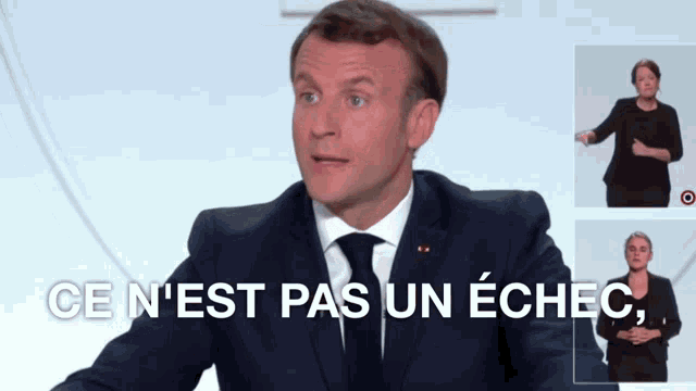 a man in a suit and tie with the words ce n'est pas un echec below him