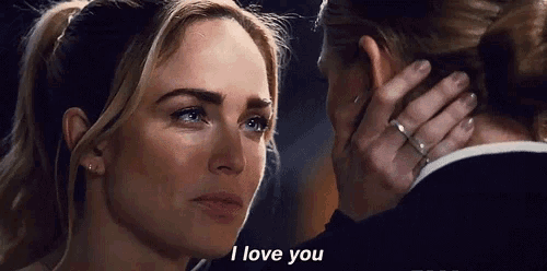 a man and a woman are looking into each other 's eyes and the woman is saying i love you