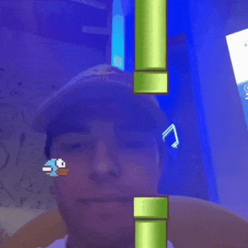 a man wearing a hat is looking at his phone which has a sticker on it that says dji