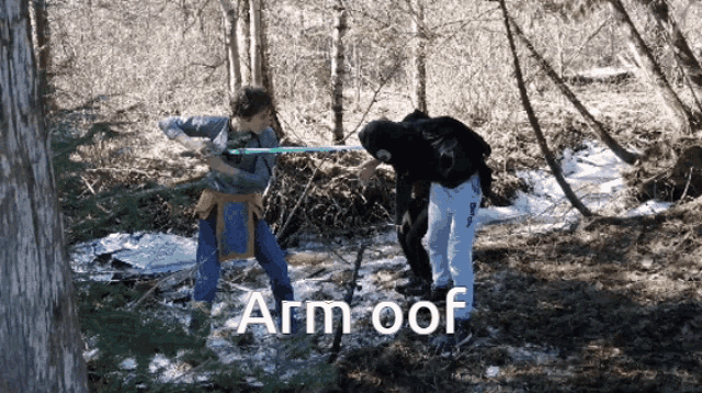 two people standing in the woods with the words arm oof below them