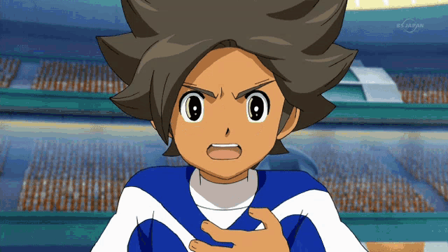 a boy in a blue and white outfit with a tv japan logo in the corner