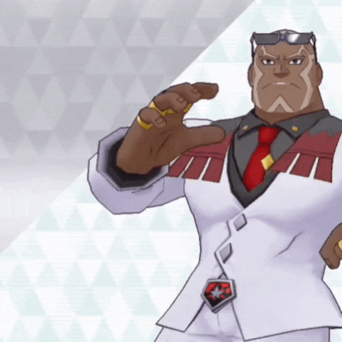 a man in a suit and tie is giving a thumbs up sign