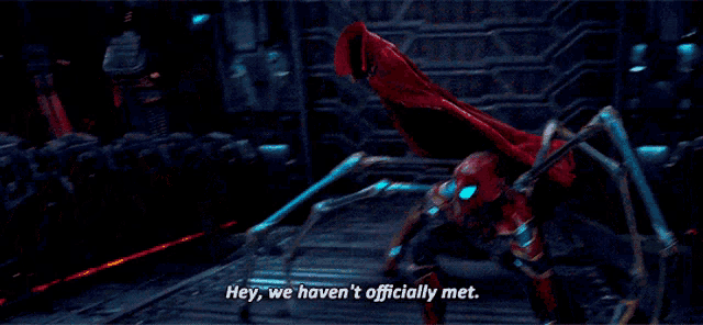 a spider man says hey we haven 't officially met in a dark room