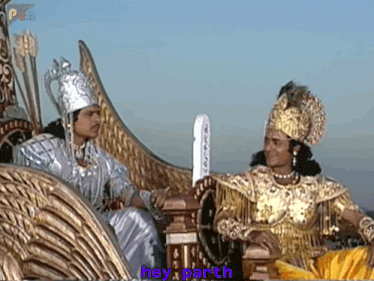a man in a gold costume says hey parth to another man in a silver costume