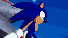 sonic the hedgehog is flying through the air with a jet in the background