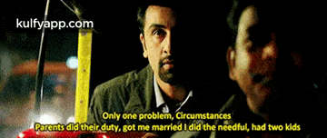 a man with a beard is talking to another man in a dark room with the words only one problem .