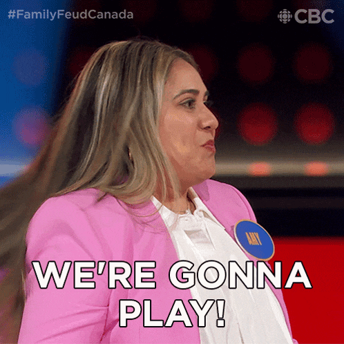 a woman says we 're gonna play while wearing a pink jacket