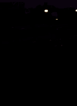a blurry picture of a person in the dark