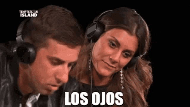 a man and a woman wearing headphones with the words los ojos written on the bottom .