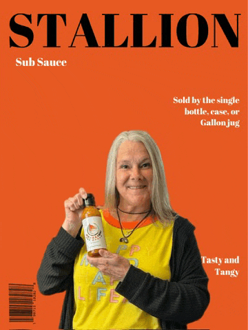 a woman holding a bottle of stallion sub sauce in front of an orange background