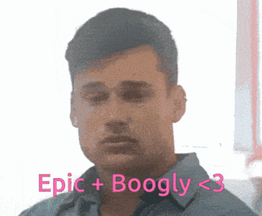 a man in a blue shirt with the words epic + boogly < 3 below him
