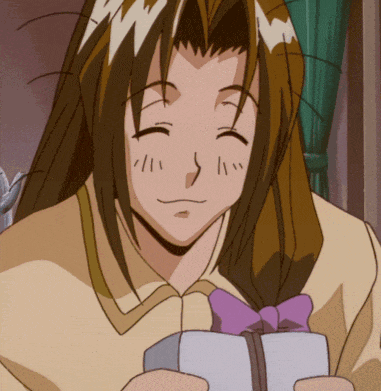 a close up of a person holding a gift box