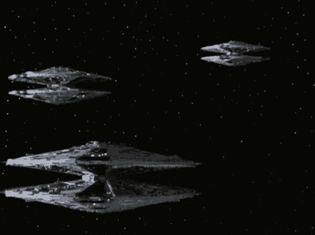 a group of spaceships are flying through a starry night sky