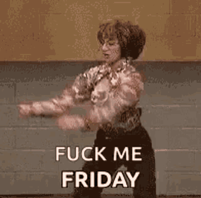 a woman is dancing with the words `` fuck me friday '' written on her face .