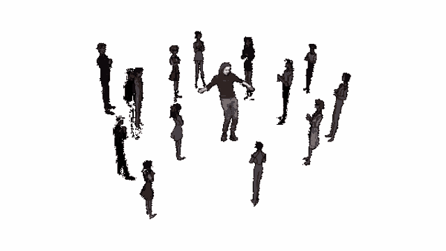 a group of people standing in a circle with a man standing in the middle