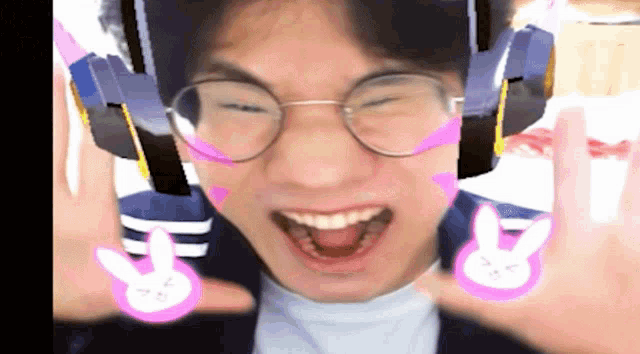 a man wearing glasses and headphones with bunny face paint on his face