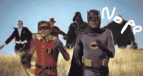 a group of superheros are running in a field and the word nope is written on the ground