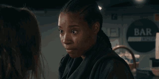 a woman is talking to another woman and the words comprehende are visible