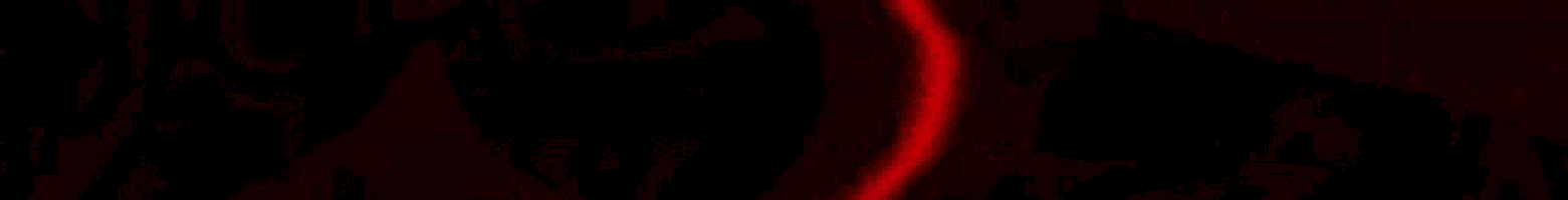 a close up of a chain on a dark red background