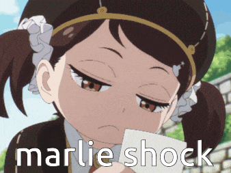 a little girl is holding a piece of paper that says marlie shock on it