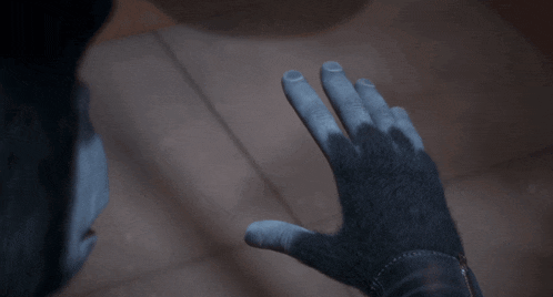 a close up of a person 's hand with the fingers visible