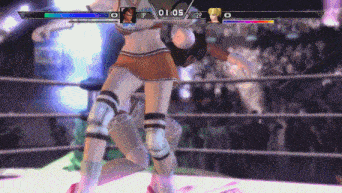 two female wrestlers are fighting in a video game with the time of 01:55