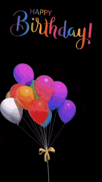 a birthday card with a bunch of balloons and confetti coming out of it