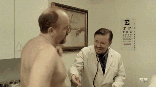 a shirtless man is talking to a doctor with a stethoscope .