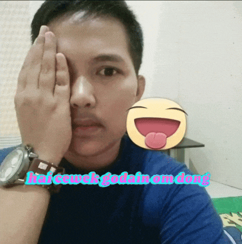 a man covering his face with his hand and a smiley face behind him that says hai cewek gobain am dong