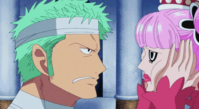 a man with green hair and a woman with pink hair are standing next to each other