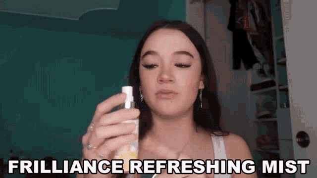 a woman holding a spray bottle with the words friliance refreshing mist written below her