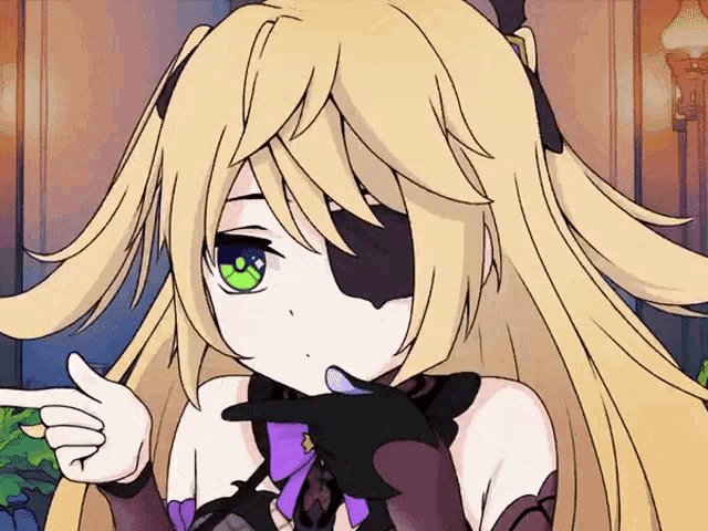 a girl with long blonde hair and green eyes is giving a thumbs up sign