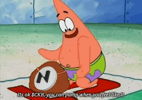 patrick star from spongebob squarepants is kneeling down on a mat holding a ball with a n on it .