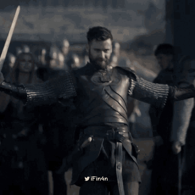 a man in armor is holding a sword in front of a group of soldiers with the hashtag # fin4n