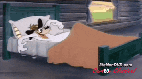 a cartoon of a dog laying in a bed with 8thmandvd.com written on the bottom