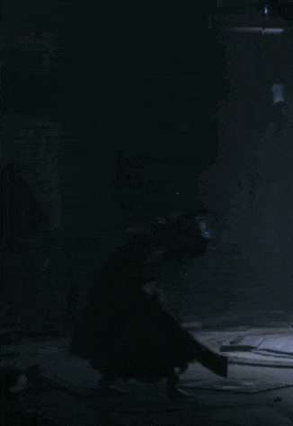 a dark room with smoke coming out of it