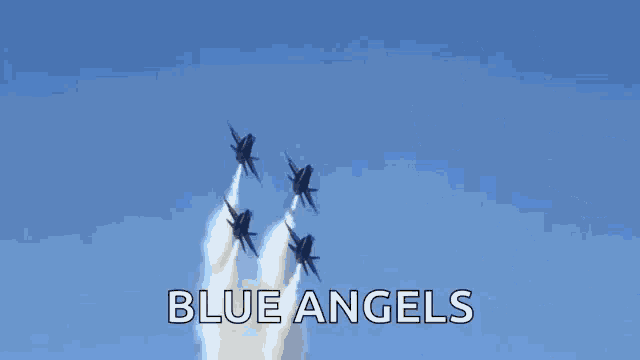a group of us navy fighter jets fly in formation