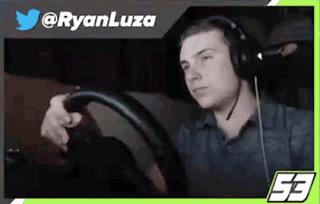 a man wearing headphones is driving a car with the twitter account @ryanluza behind him