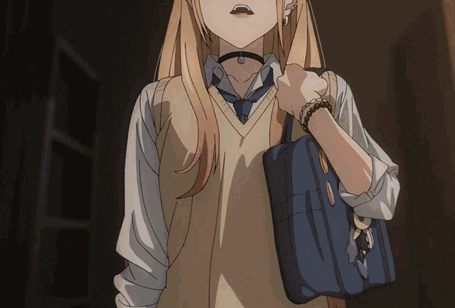 a girl in a school uniform is holding a blue purse