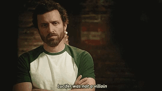 a man with a beard is standing with his arms crossed and says lucifer was not a villain