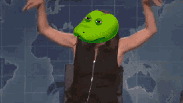 a woman with a snake on her head talks to a man in a suit and tie