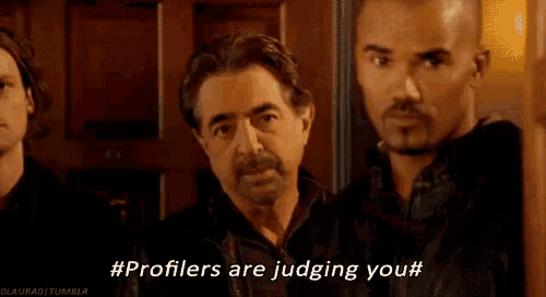 a group of men are standing next to each other and one of them is saying `` profilers are judging you ''